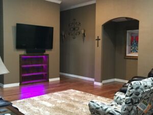 TV install with custom cabinet and built in LED lighting