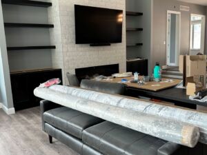 Mounted TV on brick wall