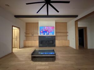 TV mounted over fireplace